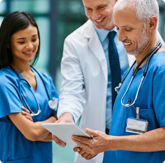 Radiology team reviewing scans